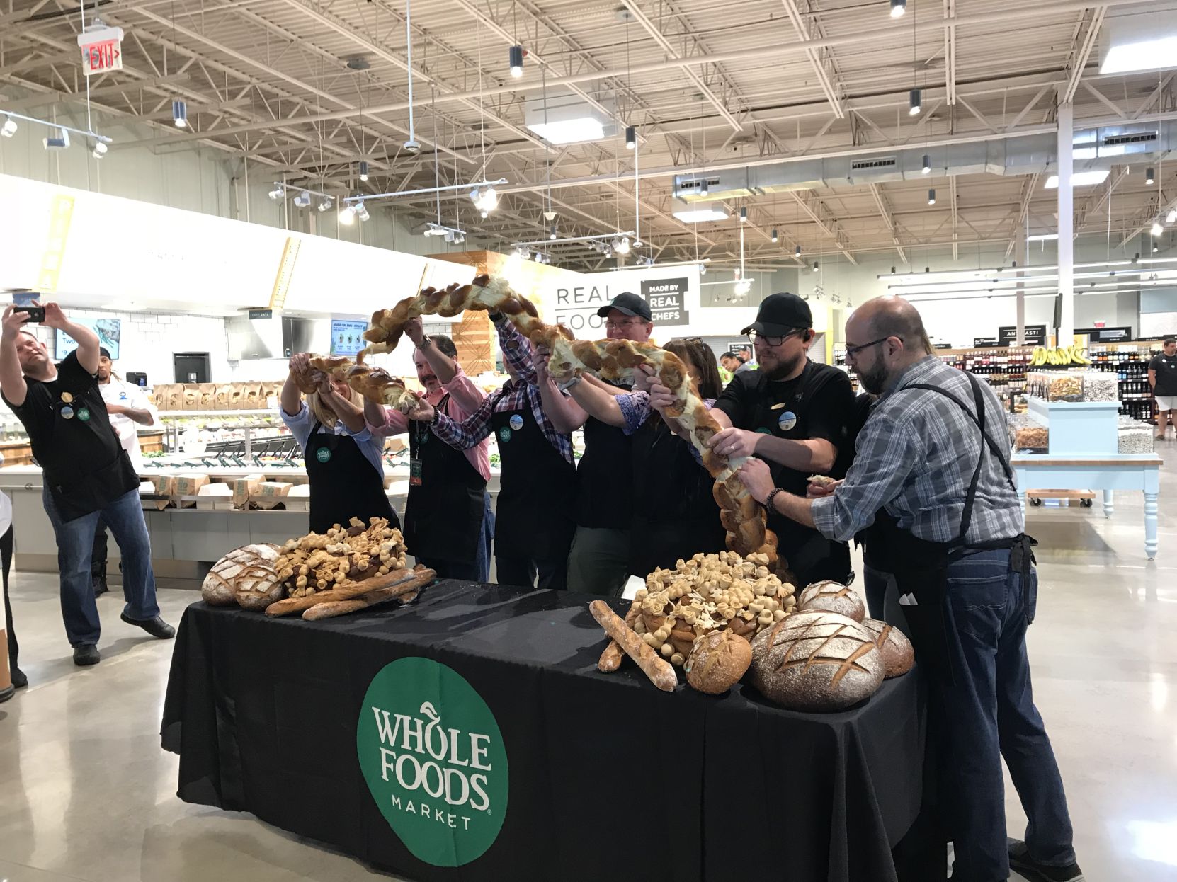 Bread breaking Whole Foods